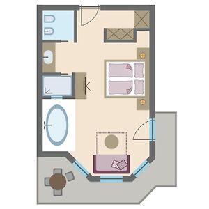 Suite lifestyle con letto queen size